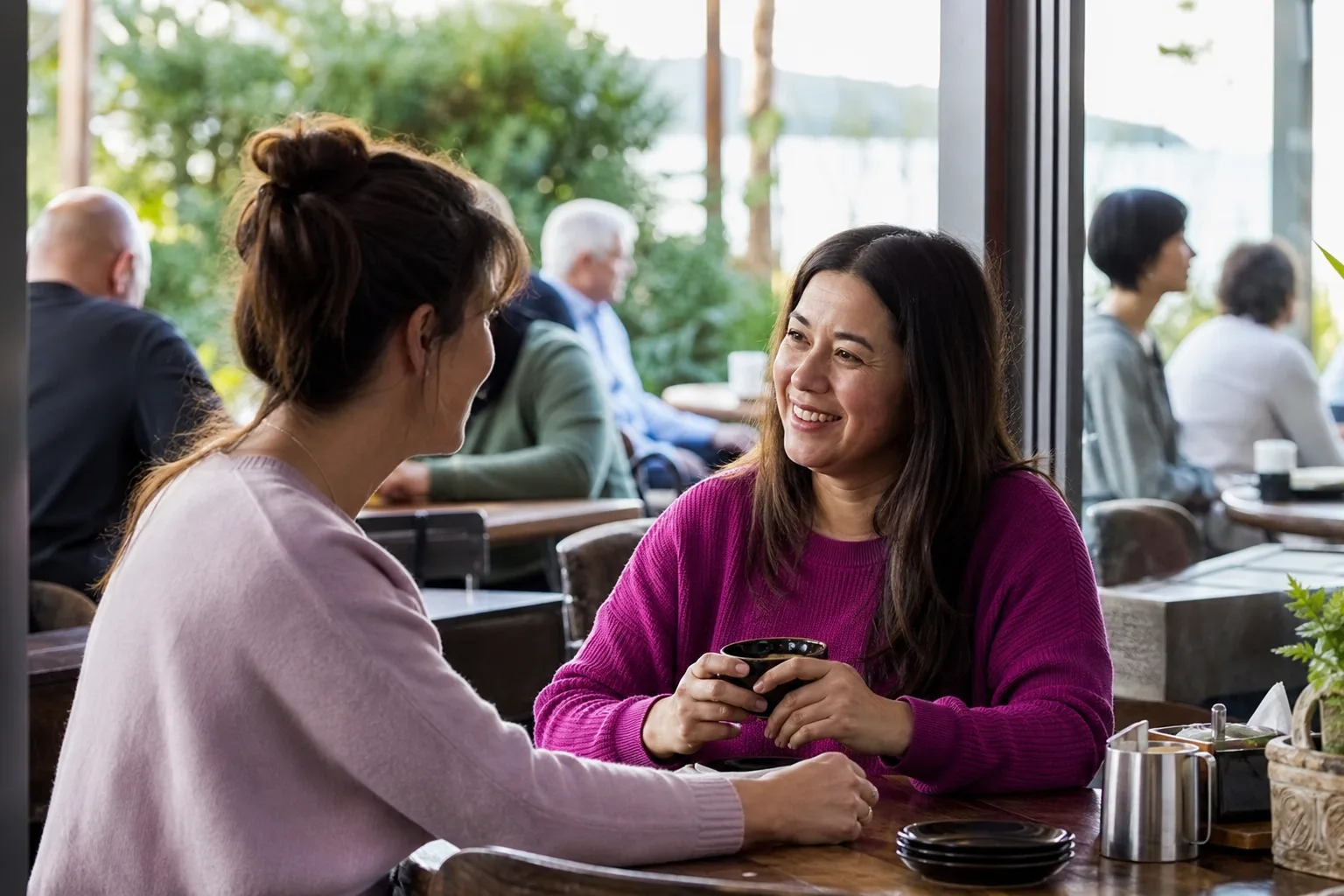 Christian singles talking over coffee at a relaxed Birmingham social event