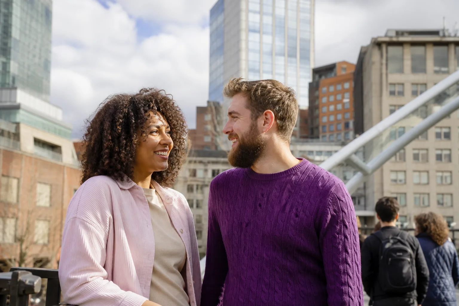 Two Birmingham singles talking over coffee beside the city-centre canals